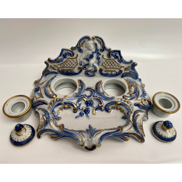 Antique French Porcelain Inkwell with Embossed Detailing and Gold Accents - Early 20th Century. Step back in time with...