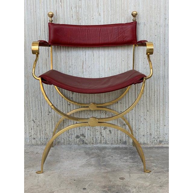 About Pair of beautiful 1980s Italian chrome gold and red leather Savonarola director's chair in perfect conditions, with...