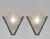 SEVB A pair of large art deco wall sconces made in France around 1930. Nickel plated bronze or solid brass mounts hold...
