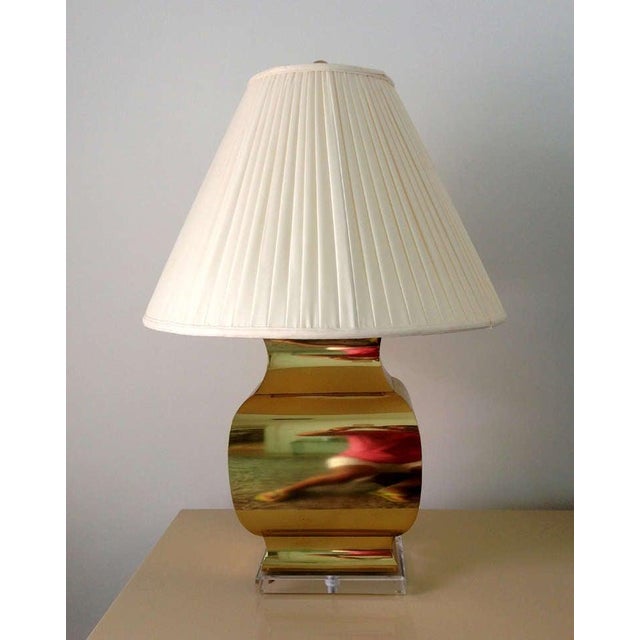 A large and dramatic pair of lamps in Hollywood Regency style as a modern interpretation of chinese classic urn from Han...