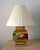 A large and dramatic pair of lamps in Hollywood Regency style as a modern interpretation of chinese classic urn from Han...