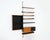 Bookcase containing 6 shelves, a cabinet with a lockable door and 3 drawers, and a cabinet with one shelf. The drawers do...