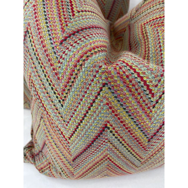 Custom pair of 22” pillows covered in a multi colored woven fabric in a chevron pattern. These pillows are self welted,...