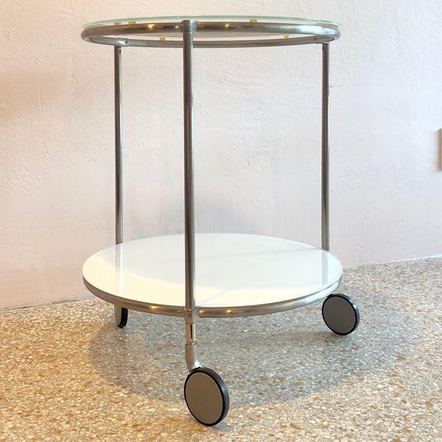 Add a touch of timeless Scandinavian minimalism to your home with this authentic, vintage IKEA STRIND side table. Designed...