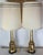 This elegant pair of vintage lamps by Paul Hanson feature a stunning reverse-painted gilt crackle design. The sleek glass...
