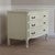 Origin: Belgium Dimensions in cm: H 85 / W 122 / D 60 Characters or special features: Curved chest of drawers in cream-...