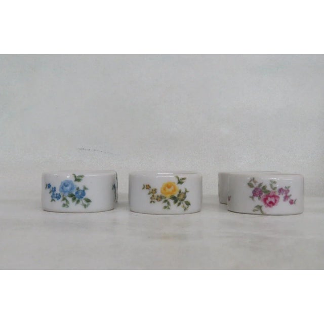 This gorgeous set of napkin rings is made of porcelain. This set was made by Shafford in Japan, see pictures, and it comes...