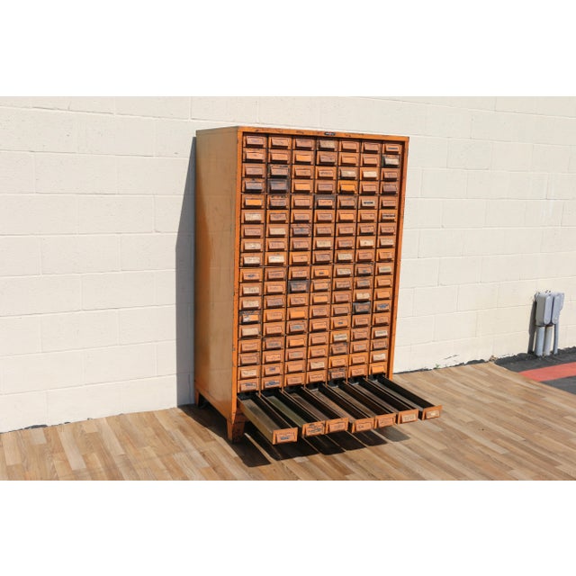 Fantastic vintage Addressograph industrial steel cabinet featuring an impressive 133 drawer configuration. This striking...