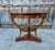 Handcrafted "Versailles" round center table by Alfonso Marina y Cia., Mexico City, with the original maker’s label dated...