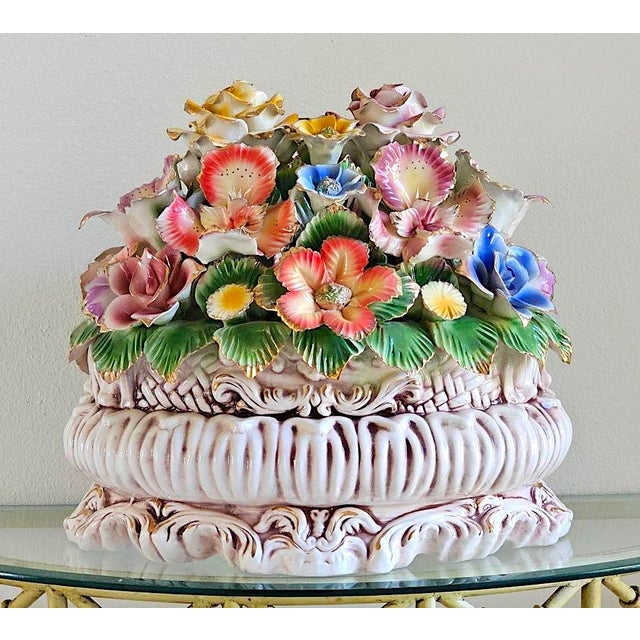 Bring timeless Italian elegance to your home with this beautiful vintage Capodimonte-style porcelain floral centerpiece....