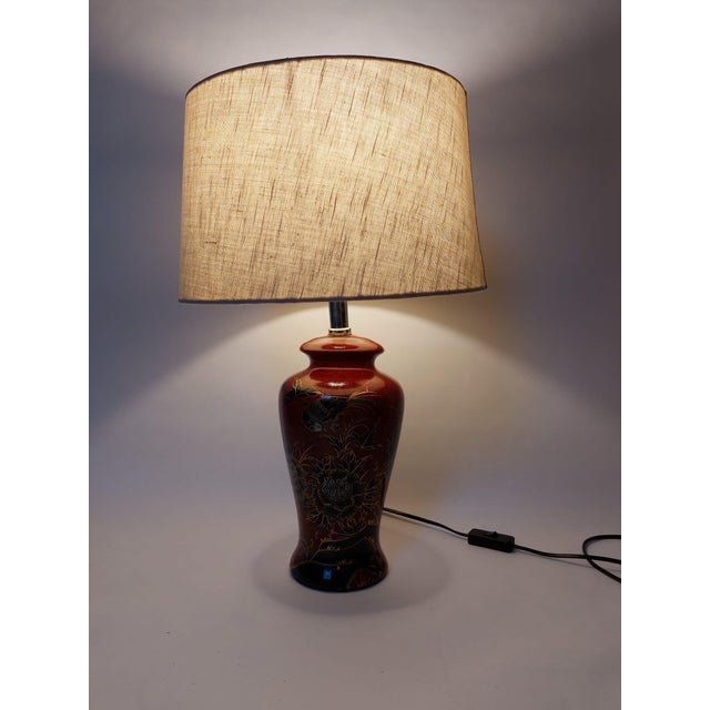 The lamp is in working condition. and has small trace of use on her base. Just look to the detailpictures. The lamp shade...