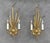 Exceptional Spanish gilt-tole wall sconces by Ferrocolor, dating to the 1950s. Executed in hand-worked gilt metal as...