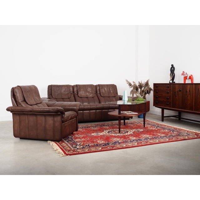 The sofa was made in the 1970s, produced by the well-known Swiss manufactory de Sede. The structure was made of solid...