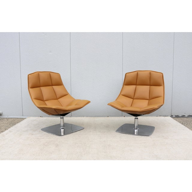 Fabulous pair of Jehs+Laub swivel lounge chairs, designed by the German duo Markus Jehs and Jurgen Laub and crafted by the...