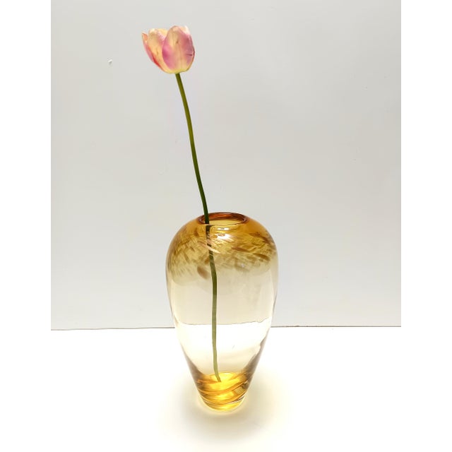 Made in Italy, 1960s. This is a vase attributed to Fratelli Toso, made in hand-blown polychrome Murano glass with autumnal...