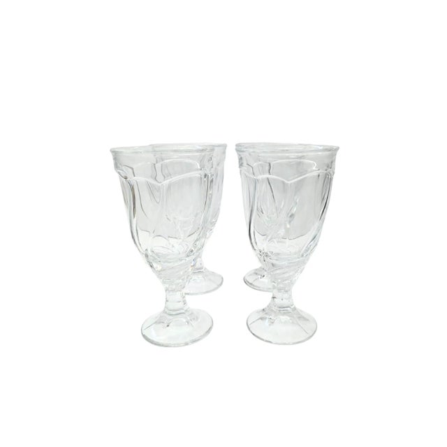 This set of 4 Noritake Sweet Swirl crystal goblets offers a clean, classic silhouette with subtle vertical ridges that add...