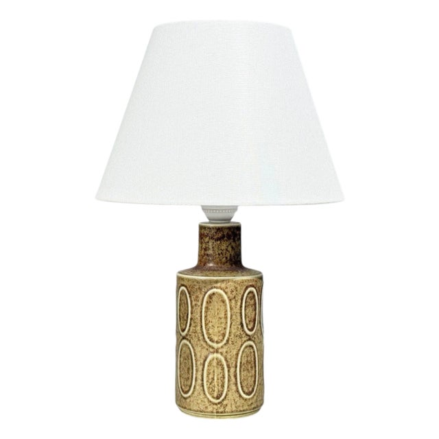 Desiree Stentöj, Danish Mid-Century Modern, Table Lamp, Brown Stoneware, Denmark, 1960s A brown glazed table lamp designed...