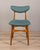 Pair of chairs with wooden structure with seat and back covered in green fabric, Italian design, 1960s.
