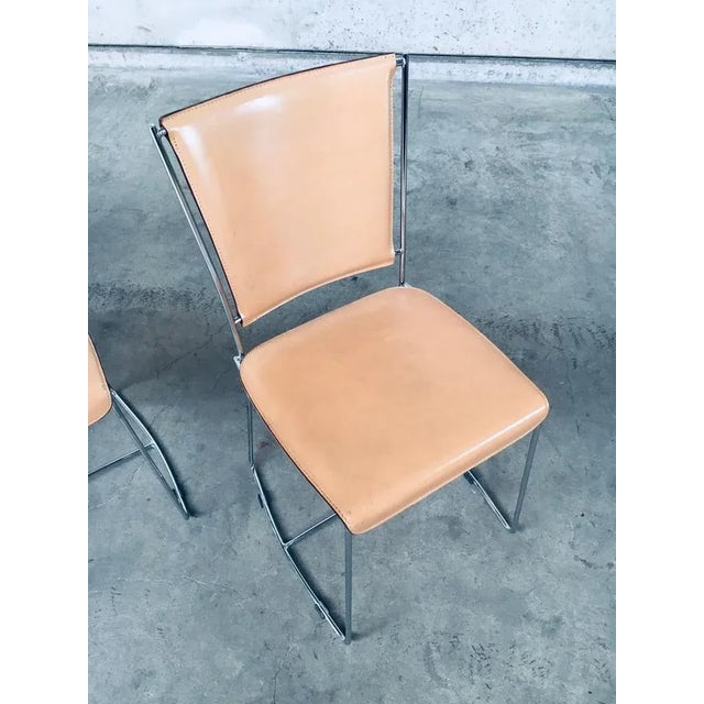 Vintage Postmodern Italian Design Leather Dining Chair set by Segis, Italy 1990's. Beige thick leather with chrome metal...