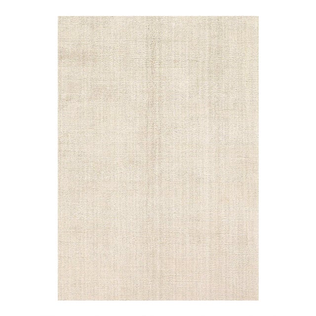 Loomed by hand in India, our Shine Rug blends durable lustrous viscose for a striated look that's both modern and...