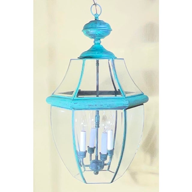 A Timeless Piece of Architectural Charm This is an opportunity to acquire a stunning, brass hanging lantern with a...