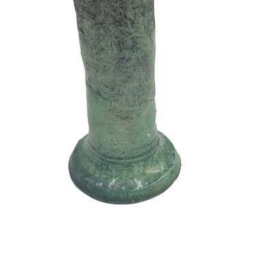 A Moroccan Tamegroute glazed candlestick holder is a handcrafted piece made in the historic pottery village of Tamegroute...