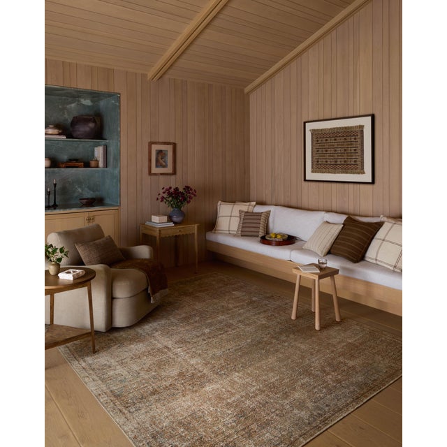 The Cambria Collection is a beautifully executed vintage-style area rug from Amber Lewis x Loloi with a blended jute and...