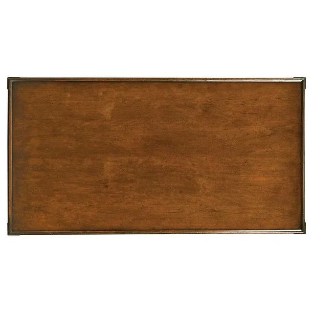 A classic table inspired by a 19th Century Swedish original. The rectangular top and lower shelf are joined by bottom...