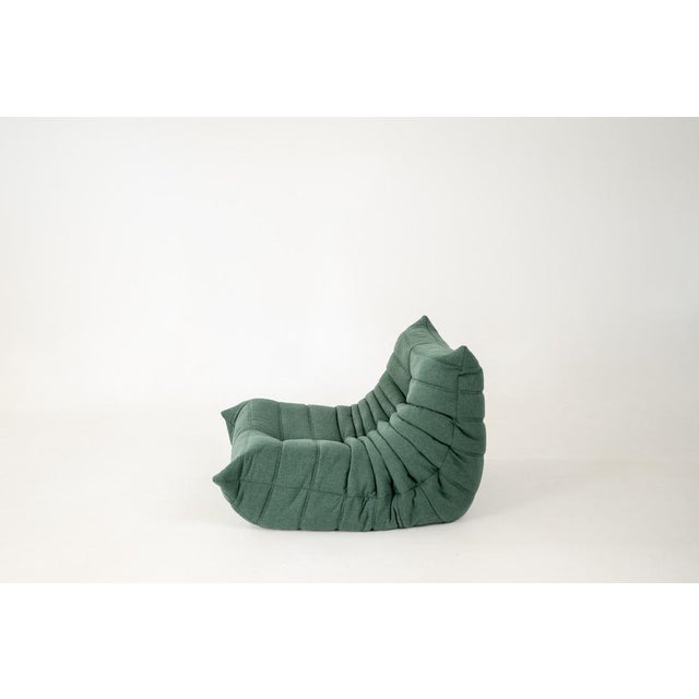 This Togo has been reupholstered with new foam and high-quality new fabric, keeping its inner structure, giving the item...