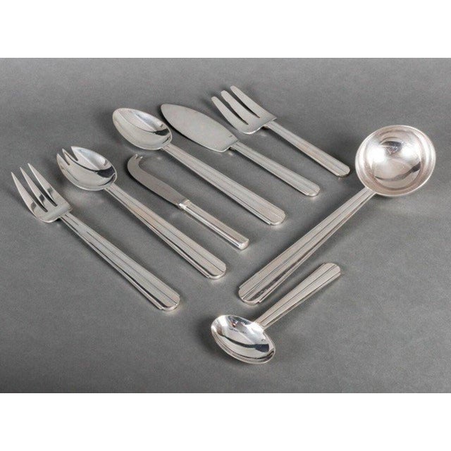 Part of a 105-piece silver-plated flatware set: "Chantaco," reissued by Puiforcat circa 2000. This design was created by...