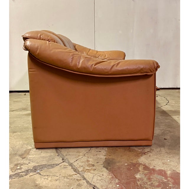Produced in Denmark during the 1980s, this substantial three-seat sofa combines deep proportions, soft aniline leather,...