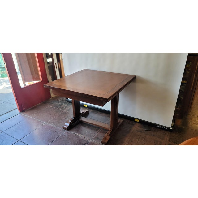 English Art Deco Oak Draw leaf table. Sides pull out and store under top. Oak wood and art deco 1920s styling. 36x36 open...