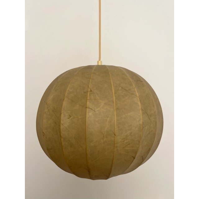 Beautiful pair of german "cocoon" chandeliers. These chandeliers were designed and manufactured during the 1960s in...