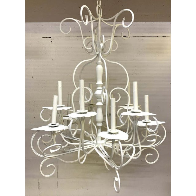 Lily Pad chandelier, in the style of Salterni, wrought iron fitted with two tiers of ten lily pad lights, can be used...