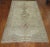 One of a kind, mid 20th-century Hand-knotted Turkish rug in gallery size format in neutral colors with pops of pink....