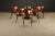 This exceptional set of 1960s Jacaranda rosewood 'Series-7' stacking chairs by Arne Jacobsen represents a rare and...