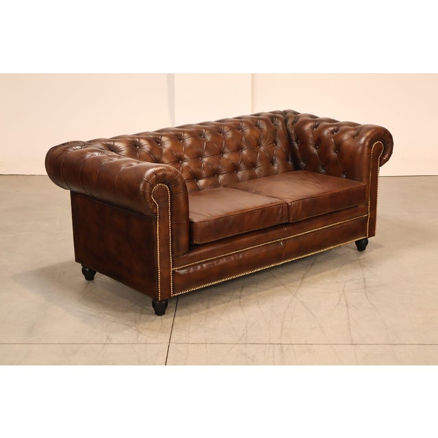 High Quality Chesterfield Style Sofa Featuring A Traditional Chesterfield Silhouette With Deep Button Tufted Back And...