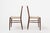 Beautifully designed teak dining chairs with curved back with bars, slender legs and braided rope seat. The teak wood...