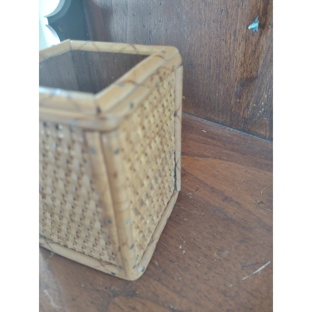 Offered is a vintage wicker and bamboo pencil holder. It is in excellent shape and measures 4" tall by 3" square.