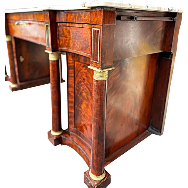 Rare Classical Federal Empire Marble Top Sideboard - school of Duncan Phyfe This exquisite sideboard showcases the...