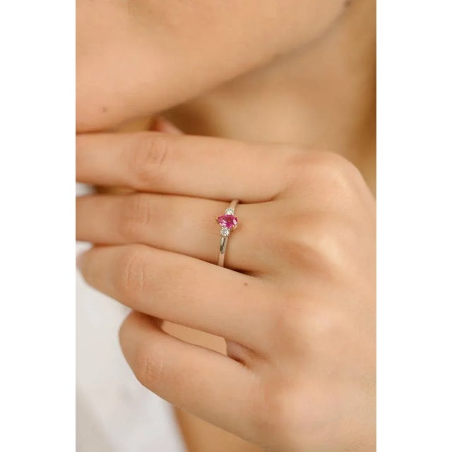 This is part of Chairish’s Fine Jewelry assortment. Stackable Ruby and Diamond Three-Stone Ring in 14K Gold featuring...