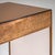 Small desk featuring a single drawer and a frame made of hammered copper with a crossbar stretcher. The desk stands on...
