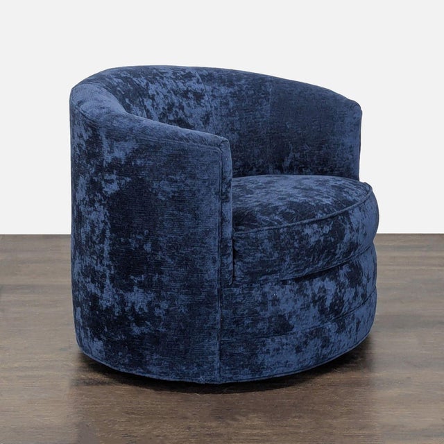 Add a touch of style and comfort to your lounge with this modern blue velvet swivel chair. The round shape and plush seat...