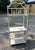 Etagere in an Ivory Bisque Color with deep shelves. Top Shelf has a Glass Insert. Gives ia rattan coastal vibe and a great...