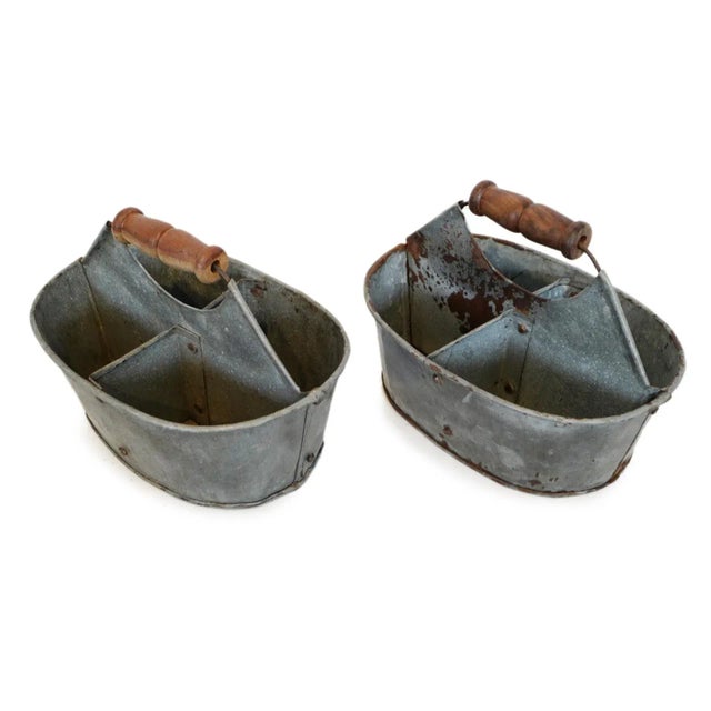 Vintage galvanized metal farm four-way bucket from India. Original wooden handle on top. Great used for tabletop...
