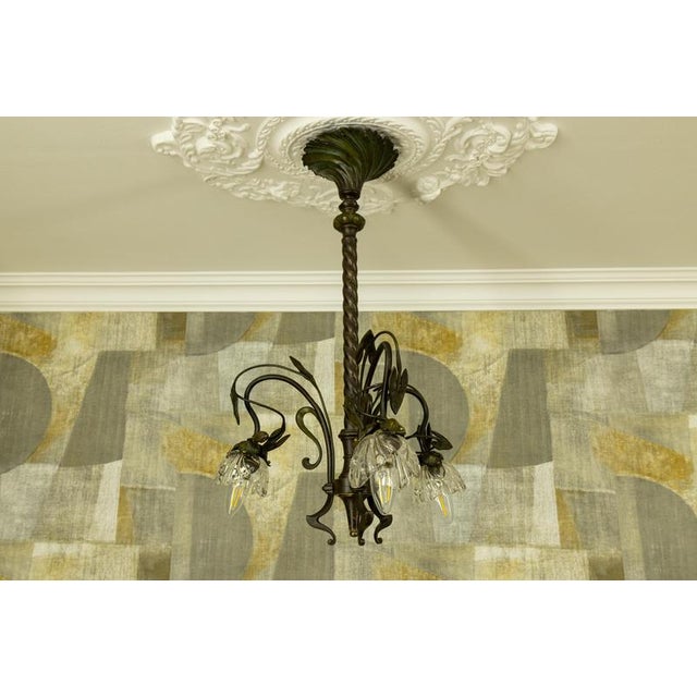 French Art Nouveau Bronze Chandelier with Clear Glass Botanical Shades, 1910 For Sale - Image 9 of 18
