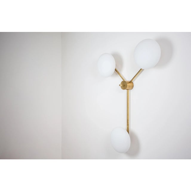 The Stella Triennale Wall / Ceiling Light brings elegance to midcentury design through the inspiration of Italian design -...