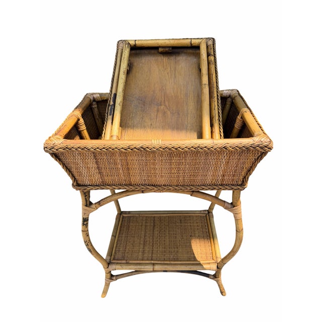 Lovely woven rattan two tier table that can be used in entry way with storage compartment on top. The top is a removable...