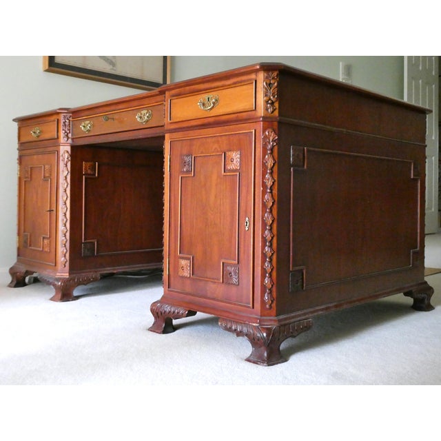 Exquisite Double Pedestal Partner’s Desk handcrafted in mahogany. Georgian Style, measures 62x39x31. Many carved elements,...