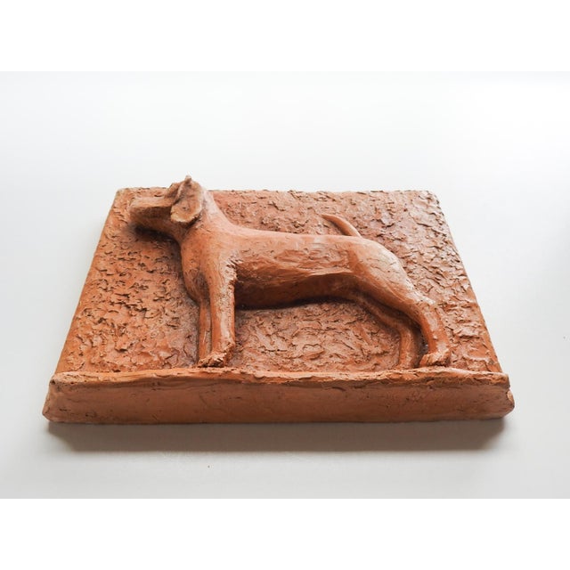 Mid 20th century plaster sculpture plaque of a dog, looks like a hound of some kind, maybe a Beagle. Signed Val Forslund...